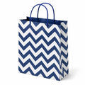 Borsa regalo 26 x 12 x 32 cm in carta blu e bianca con manici intrecciati a zig zag